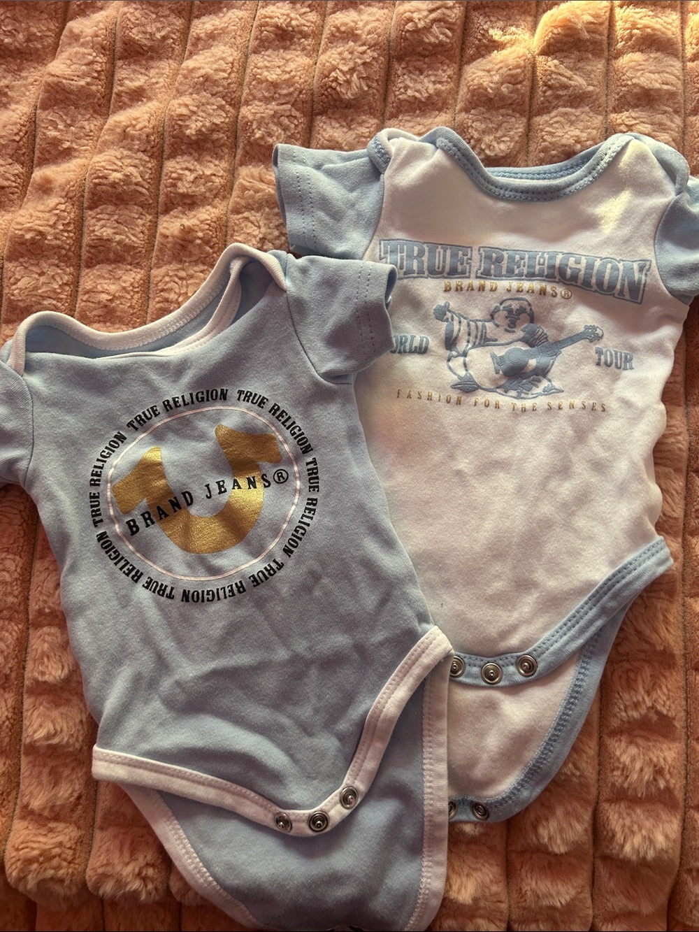 Fits a newborn perfectly! True Religion Light Blue & White  Baby Bodysuits